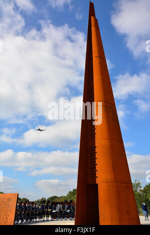 WWII Dakota flies over The International Bomber Command Centre's Memorial Spire unveiled at Canwick Hill, Lincoln, 2nd October, 2015. Stock Photo