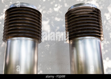 Two big ventilation pipes Stock Photo