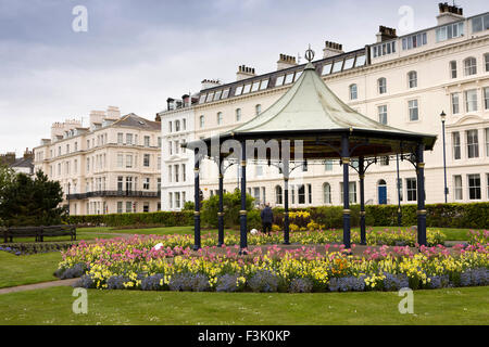UK, England, Yorkshire East Riding, Filey, Crescent Garden, bandstand and floral planting below seafront houses Stock Photo