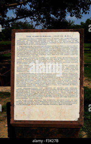 The explanation detail monument information board in Hindi white text on white marble at the entrance to the Kanch Mahal Agra UP Stock Photo