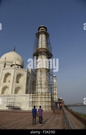 Taj Mahal white marble mausoleum pillar renovation Mughal architecture cleaning minar at southern bank  Yamuna River Agra India Stock Photo