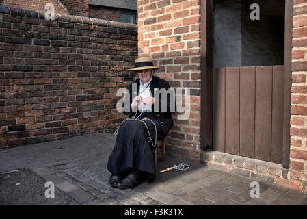 Black Country Museum Dudley. Woman traditionally dressed in 1900's period costume West Midlands England UK Stock Photo