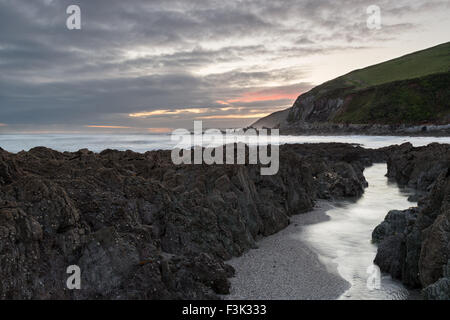 A stormy night on the beach at Portwrinkle of the south coast of Cornwall Stock Photo