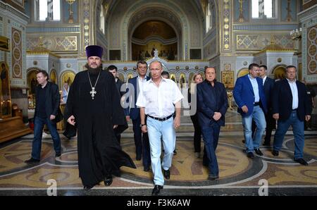 Russian President Vladimir Putin and former Italian Prime Minister Silvio Berlusconi visit St. Vladimir's Cathedral September 12, 2015 in Chersonesus, Crimea, Russia. Stock Photo