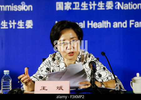 (151009) -- BEIJING, Oct. 9, 2015 (Xinhua) -- Wang Bin, deputy director of the disease prevention and control division with the National Health and Family Planning Commission, answers questions during a press conference on the work of mental health in China in Beijing, capital of China, Oct. 9, 2015. (Xinhua/Shen Bohan)(wjq) Stock Photo
