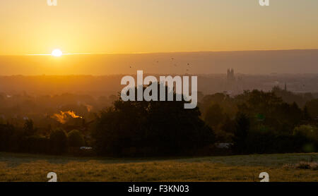 Canterbury, Kent, UK. 9th October 2015: UK Weather. Sunrise over the historic city of Canterbury with it's Cathedral rising above the misty surroundings on a chilly Autumn morning. The temperature will be upto 16C as the good weather continues Credit:  Alan Payton/Alamy Live News Stock Photo