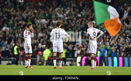 Dublin, Ireland. 08th Oct, 2015. German's players react during the UEFA EURO 2016 qualifying soccer match Ireland vs Germany in Dublin, Ireland, 08 October 2015. Ireland won 1-0. Photo: Peter Kneffel/dpa/Alamy Live News Stock Photo