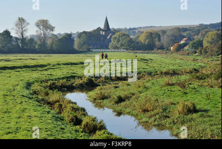 Lewes, Sussex, UK. 9th October, 2015. A stunning morning for a walk by the River Cuckmere at Alfriston in East Sussex as early morning mist lifts in the sunshine .  Temperatures are expected to reach near 20 degrees today but cooler weather is forecast for the weekend  Credit:  Simon Dack/Alamy Live News Stock Photo