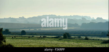 Lewes, Sussex, UK. 9th October, 2015. Early morning mist lifts on a beautiful morning near Lewes East Sussex today . Temperatures are expected to reach near 20 degrees today but cooler weather is forecast for the weekend  Credit:  Simon Dack/Alamy Live News Stock Photo