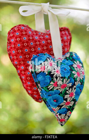 Home made hearts clothes hanging. Stock Photo