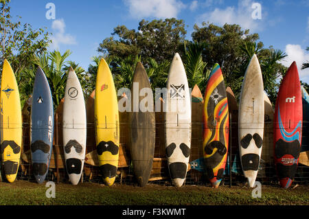 Surfboards decoration in a garden. Huelo. Hawaii. Huelo is a small community located along the Road to Hana (Hana Highway). It i Stock Photo