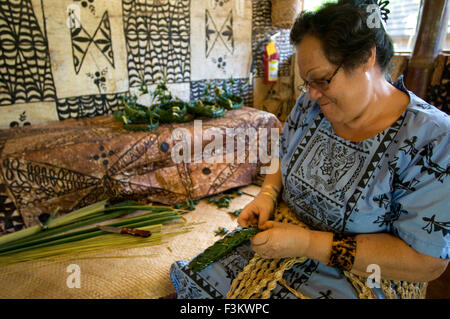 Old woman doing crafts in Polynesian Cultural Center. O'ahu. Hawaii. Hawaii Hawaiian Islands Oahu Polynesian Cultural Center Sam Stock Photo