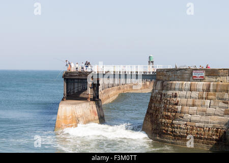 looking out to the North sea at west pier, Whitby, North Yorkshire, England Stock Photo
