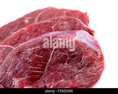 Macro closeup of leg lamb meat steaks isolated on white Stock Photo