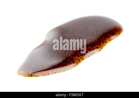 Macro closeup of natural real vanilla extract isolated on white Stock Photo