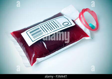 closeup of a blood bag with a label with the text O RH positive, with a slight vignette added Stock Photo