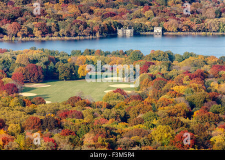 Aerial view of the Great Lawn and Jacqueline Kennedy Onassis Reservoir in Central Park with autumn foliage colors. New York Stock Photo