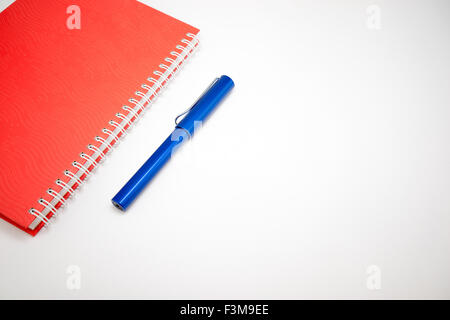Notebook and pen isolated on white background Stock Photo