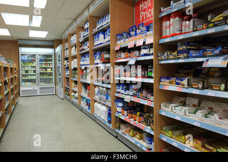 Interior aisle of Health Care store selling herbal remedies, vitamins and supplements, Southport, UK