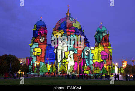 Berlin, Germany. 9th Oct, 2015. The Berliner Dome is illuminated at the beginning of the Festival of Lights in Berlin, Germany, 9 October 2015. Numerous iconic buildings in the city are lit up from 9 until 18 October 2015. Photo: Paul Zinken/dpa/Alamy Live News Stock Photo