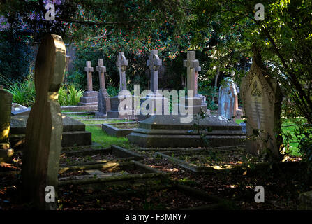 Victorian gravestones in churchyard. Church of Saint Michael and Stock ...