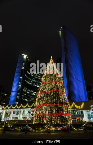 Toroto City Hall, illuminated in purple and decorated for the Christmas season. Stock Photo