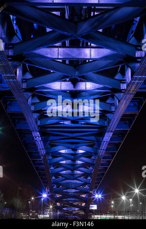 The Peach Bridge linking Canada to the US at Fort Erie, illuminated in purple. Stock Photo