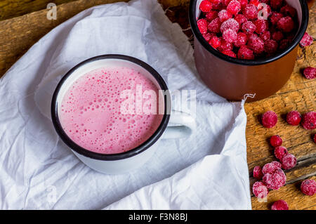 Smoothies berries of red currant in a mug rustic style Stock Photo