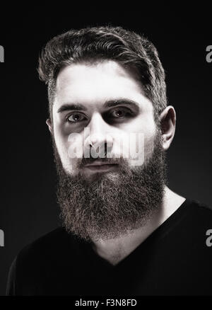 Portrait of a Teenage Hipster with Beard Stock Photo