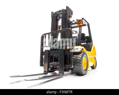 Yellow forklift truck shot on white background Stock Photo