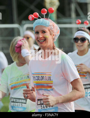 Brighton Sussex UK Saturday 10th October 2015 - Young woman wearing a shower cap taking part in the Brighton Color Run Stock Photo