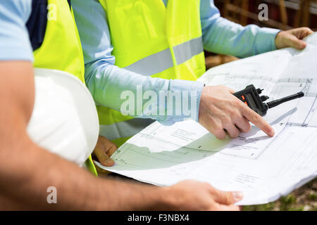 Detailed view of blueprints on a construction site Stock Photo