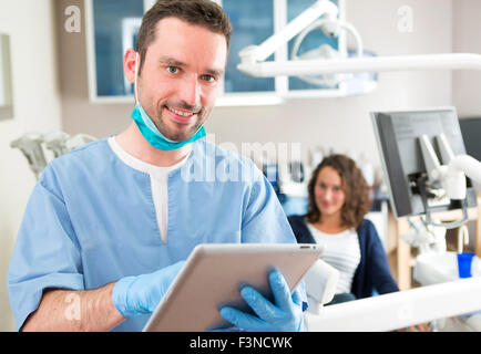 View of a young attractive dentist in his office Stock Photo
