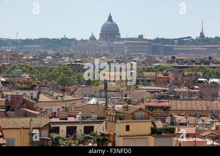 Rome, Italy. 16th July, 2015. View of the St. Peter's Basilica in the Vatican towering over the rooftops of Rome, Italy, 16 July 2015. Photo: Fredrik von Erichsen/dpa - NO WIRE SERVICE -/dpa/Alamy Live News Stock Photo