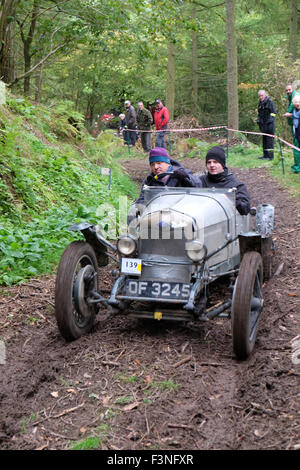 New Radnor, Powys, Wales - Saturday 10th October 2015 - The Vintage Sports Car Club ( VSCC ) hill climb trial challenge on The Smatcher a steep wooded hill just outside New Radnor. Competitors score points the further they drive up the steep hill with 25 points being awarded for reaching the top. Shown here is car #139 a 1929 Riley MK IV. Stock Photo