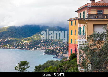 Houses high on the hill in the Italian Riviera with Camogli in the background - Italy Stock Photo