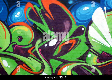 Wall with painted colourfull graffiti Stock Photo