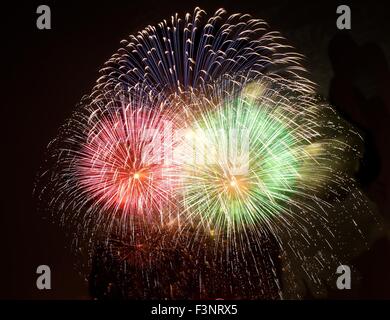 Colorful fireworks isolated in dark sky background. Malta fireworks festival. 4 of July, Independence day. Stock Photo