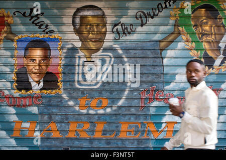 Graffiti Obama and Martin Luther King painted in the shade of an establishment of Harlem. Today, Harlem is undergoing a new rena Stock Photo