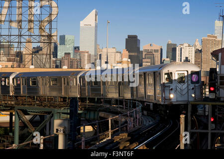 A Flushing line subway train in Times Square is wrapped in