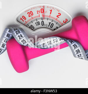 https://l450v.alamy.com/450v/f3nw53/healthy-lifestyle-fitness-weight-control-concept-closeup-pink-dumbbell-f3nw53.jpg