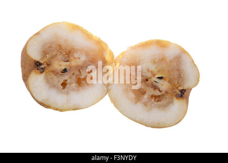 Two halves of a rotten pear isolated on white background Stock Photo