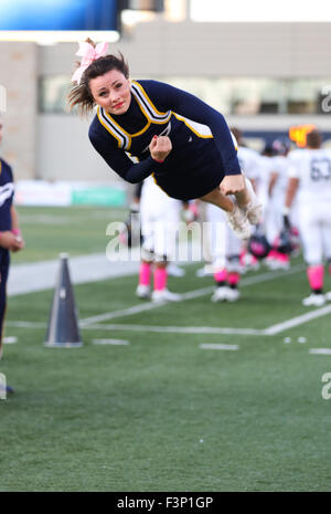 Toledo, OH, USA. 10th Oct, 2015. A Toledo cheerleader tumbles through the air during the NCAA football game between the Toledo Rockets and the Kent State Golden Flashes at the Glass Bowl in Toledo, OH. Kyle Okita/CSM/Alamy Live News Stock Photo