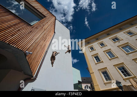 climbing scene from the town center of Ortisei (St. Ulrich) in the Dolomites, Italy Stock Photo