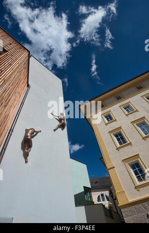 climbing scene from the town center of Ortisei (St. Ulrich) in the Dolomites, Italy Stock Photo