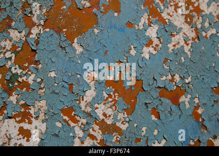 Abstract based on the flacking paint on the side of a boat hull Stock Photo