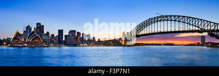 panorama of SYdney CBD cityline from Kirribilli across Harbour looking out at skyscrapers, towers, Harbour Bridge Stock Photo
