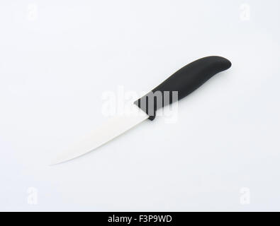 ceramic knife with black handle on white background Stock Photo