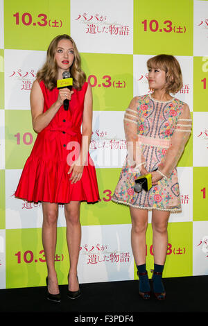 (L to R) American actress Amanda Seyfried and Japanese model, talent and singer IMALU speak during a stage greeting for the film Fathers and Daughters on October 11, 2015, Tokyo, Japan. The movie was released in the Japanese theaters on October 3rd. © Rodrigo Reyes Marin/AFLO/Alamy Live News Stock Photo