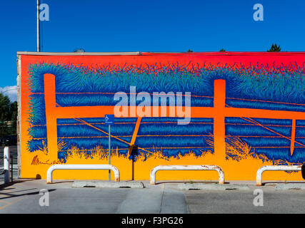 Colorful exterior wall mural by Artist David Klaren; US Post Office; Pinedale; Wyoming; USA Stock Photo